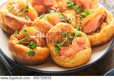 Yorkshire Pudding. Traditional English Yorkshire Pudding With Salmon And Radish Microgreens Side Dis