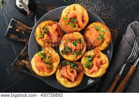 Yorkshire Pudding. Traditional English Yorkshire Pudding With Salmon And Radish Microgreens Side Dis