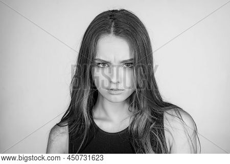 Fashion Portrait Of A Beautiful Young Woman Posing Over White Background. Close Up Portrait Of A Bea
