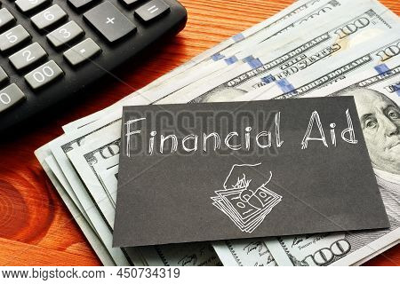 Financial Aid Is Shown On The Photo Using A Text And Picture Of Cash