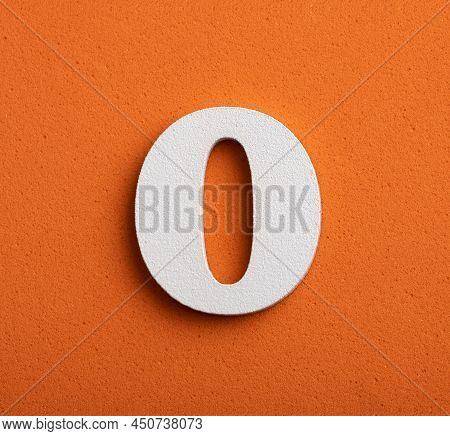Zero, White Wooden Number On Orange Background