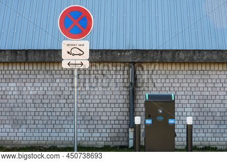 Strasbourg, France - Mar 8, 2022: Street Sign For Ev Cars Only Near New Electric Vehicle Ev Charging