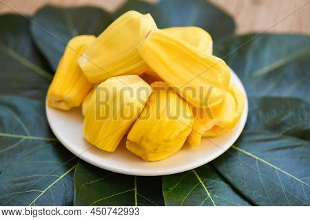 Ripe Jackfruit Peeled Tropical Fruit Fresh From Jackfruit Tree, Jackfruit On White Plate And Green L