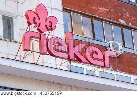 Tyumen, Russia-february 22, 2022: Rieker Logo Brand Boutique And Sign Company Of Shoes Manufacturer 