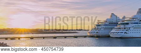 2 Cruises Ships Waiting In Tallinn Harbour For A Return Sail Date Ships. Sunset Time In Harbour. Lux