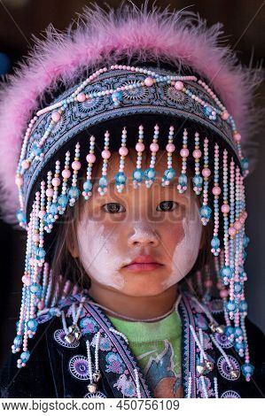 Nan, Thailand - December 22, 2011: Portrait Of A Little Hmong Tribe Girl In Traditional Clothing Dur