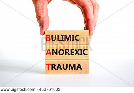 Bat Bulimic Anorexic Trauma Symbol. Concept Words Bat Bulimic Anorexic Trauma On Blocks On A Beautif