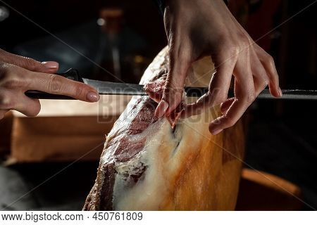 Iberian Ham Cutter. Traditional Spanish Ham, Slicing Of Dry-cured. Hamon Is Forty-eight Weeks Old. G