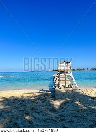 People Enjoying Junkanoo Beach In Nassau, Bahamas.