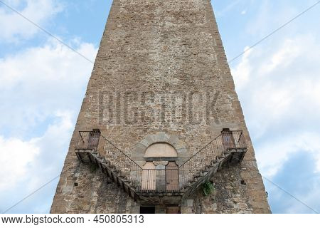 Exterior Of Antique Tower Building With Escher Architecture Style. Simmetry And Geometric Perspectiv
