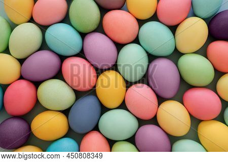 Easter Eggs Painted In Pastel Multicolored Tones . Background For Greetings, Screen Savers, Posters.