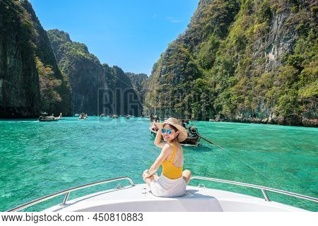 Woman Tourist On Boat Trip, Happy Traveller Relaxing At Pileh Lagoon On Phi Phi Island, Krabi, Thail
