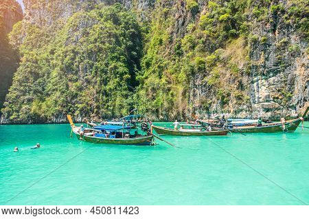 Long Tail Boat At Pileh Lagoon On Phi Phi Island, Krabi, Thailand. Landmark, Destination Southeast A
