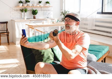 Elderly Aged Male Taking Selfie For Social Network During Exercising With Dumbbells. Old Person Man 