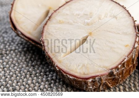 Sliced Yucca Root On Rustic Rough Jute. Raw Manioc