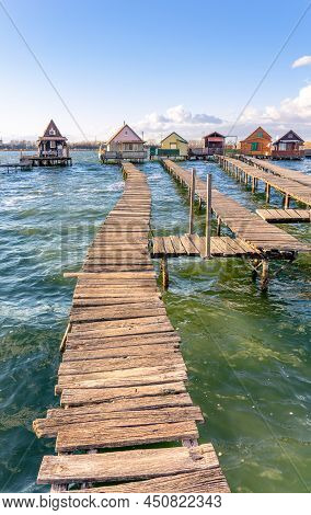 Floating Village Bungalows In Bokod Hungary Wit Wooden Pier Walkway