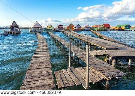 Floating Village Bungalows In Bokod Hungary Wit Wooden Pier Walkway