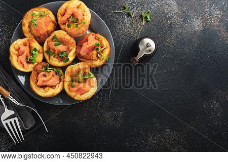 Yorkshire Pudding. Traditional English Yorkshire Pudding With Salmon And Radish Microgreens Side Dis