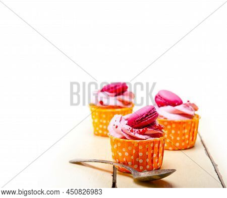Pink Berry Cream Cupcake With Macaroon On Top