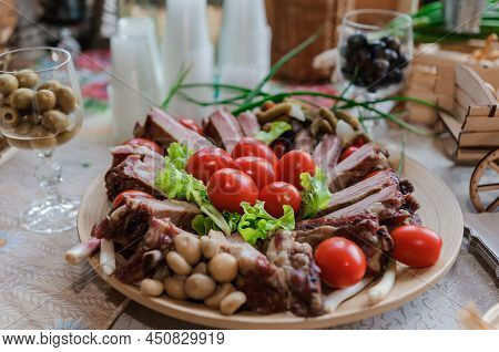 Slicing Different Types Of Meat. Meat Snacks On The Table. Wedding Buffet. Catering