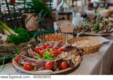 Slicing Different Types Of Meat. Meat Snacks On The Table. Wedding Buffet. Catering