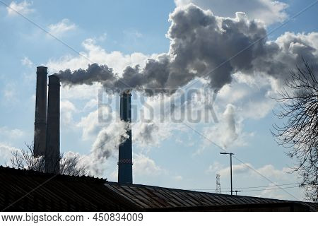Bucharest, Romania - March 10, 2022: The Chimneys Of The Cet Sud Power Plant, Which Pollute With Smo