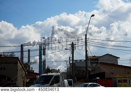 Bucharest, Romania - March 10, 2022: The Chimneys Of The Cet Sud Power Plant, Which Pollute With Smo