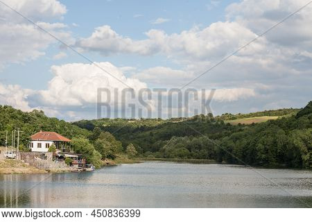 Remote House, Isolated, Standing In A Quiet Environment On A Lake, On Duboki Potok Jezero Lake, By B