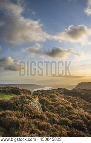 Epic Autumn Sunset Landscape Image From Holme Fell Looking Towards Coniston Water In Lake District