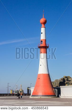 People Walking Near The Minarett Lighthouse In Bremerhaven, Germany