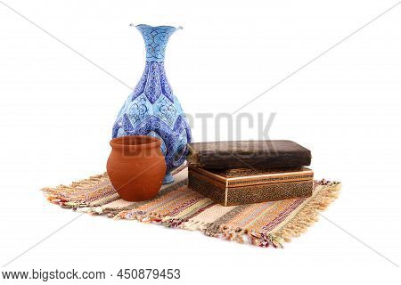 Traditional Iranian Arrangement, Enamel Cup, Pottery, Old Book, Khatam Box And Kilim