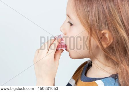 Adorable Little Girl Puts Myofunctional Trainer In The Mouth. Dental Tariner Is Made To Help Equaliz
