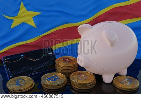 Bitcoin And Cryptocurrency Investing. Democratic Republic Of Congo Flag In Background. Piggy Bank, T