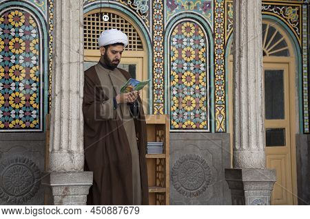 Qom, Iran - December 11, 2017: A Cleric Worships In The Shrine Of Masoumeh In Qom, A Sheikh Or Cleri