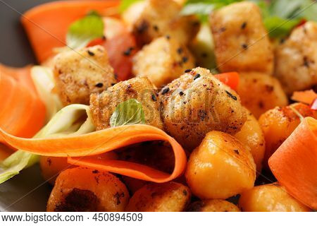 A Close Up On Sweet Potato Gnocchi With Teriyaki Tofu With Indonesian Vegetable Salad Gado Gado - Ca