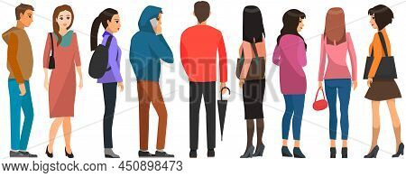 Backview Of People Looking At Something. Men And Women In Different Clothes Stand With Their Backs T