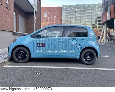 Prague, Czech Republic - March 14 2022: Blue Electric Car Of Pre Company Parked In Prague Karlin, Cz