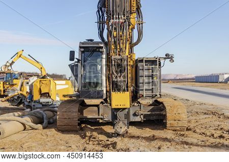 Powerful Hydraulic Drilling Rig At A Construction Site. The Device Of Pile Foundations. Bored Piles.