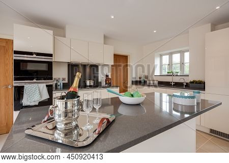 Radwinter, Essex - Sept 12 1018: Modern Furnished New Kitchen With Peninsular Island, Granite Workto