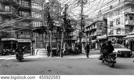 Kathmandu, Nepal - November 17, 2018: Early Morning In Kathmandu. Nepali People Going Down The Stree