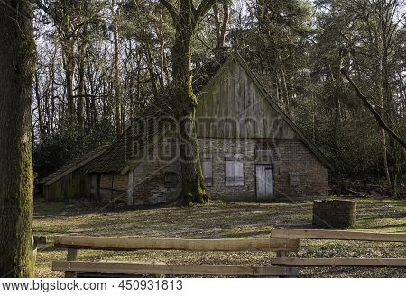 Old Farm In The Netherlands Near Burse In The Nature Reserve Burserzand, With A Wooden Fence In The 