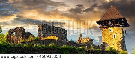Panorama Of The Nevytske Castle. Ruins Of Ancient Fortress In Evening Light. Popular Travel Destinat