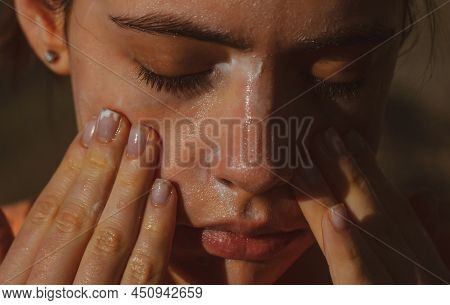 Skincare. Woman Washing Face With Cleancing Gel. Acne Protection.