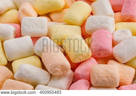 Closeup View Pile Of Colorful Marshmallows. Texture Of Fluffy Mini Marshmallows. Group Of Delicious 