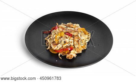 Wok Noodles With Chicken Isolated On A White Background. Pasta With Chicken Fillet.