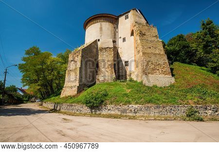 Scenic View Of Masonry Tower Of Ostroh Castle, Ostroh, Rivne Region, Ukraine. Popular Travel Destina