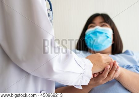 Women Asian Doctors Hold The Patient Hand And Encourage And Provide Medical Advice While Checking Th