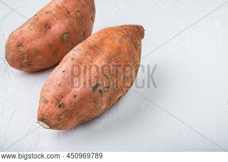 Sweet Potato Or Batat On White Background With Space For Text.