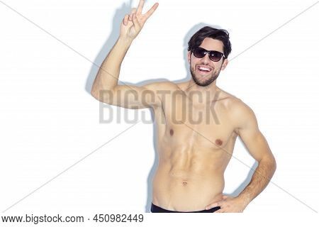 Athletic Smiling Strong Handsome Caucasian Man In Good Fit Wearing Contrasty Underware And Sunglasse