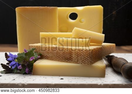 Swiss Cheese Collection, Holes Emmentaler And Gruyere Cheese Made From Unpasteurized Cow's Milk